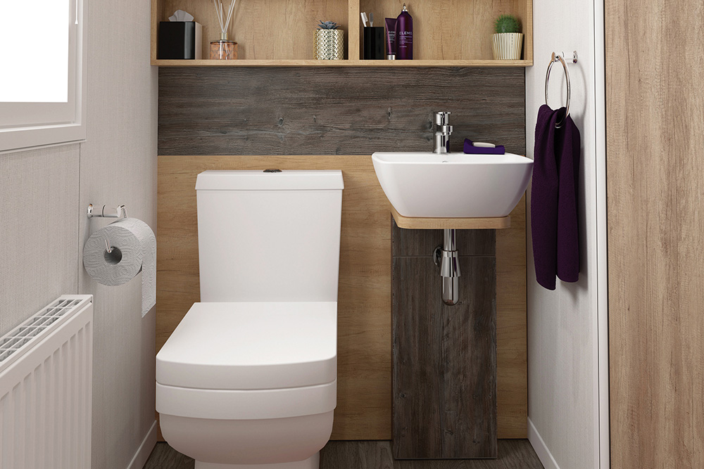 Water closet witha modern toilet and basen in the Bordeaux Escape caravan