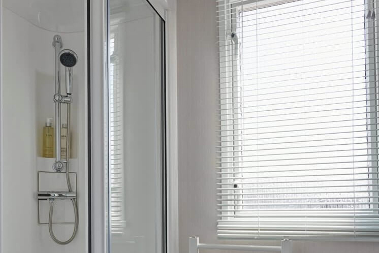 Shower room with window in the Loire caravan